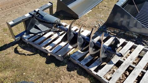 skid steer attachments st croix falls wi|baribeau implement company.